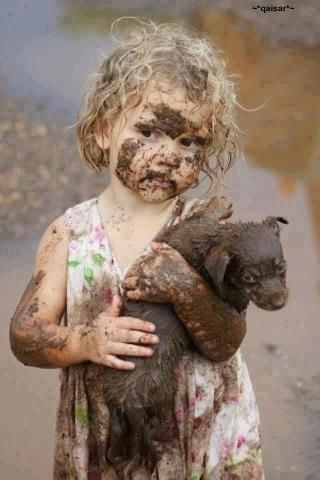 child and puppy