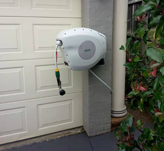 Hoselink Retractable Reel Mounted to the front of the house