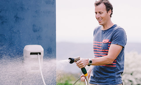 James Using Hose Reel